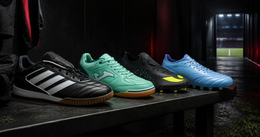 Football boots under 200 dollars arranged on a dark changing-room bench near a pitch tunnel