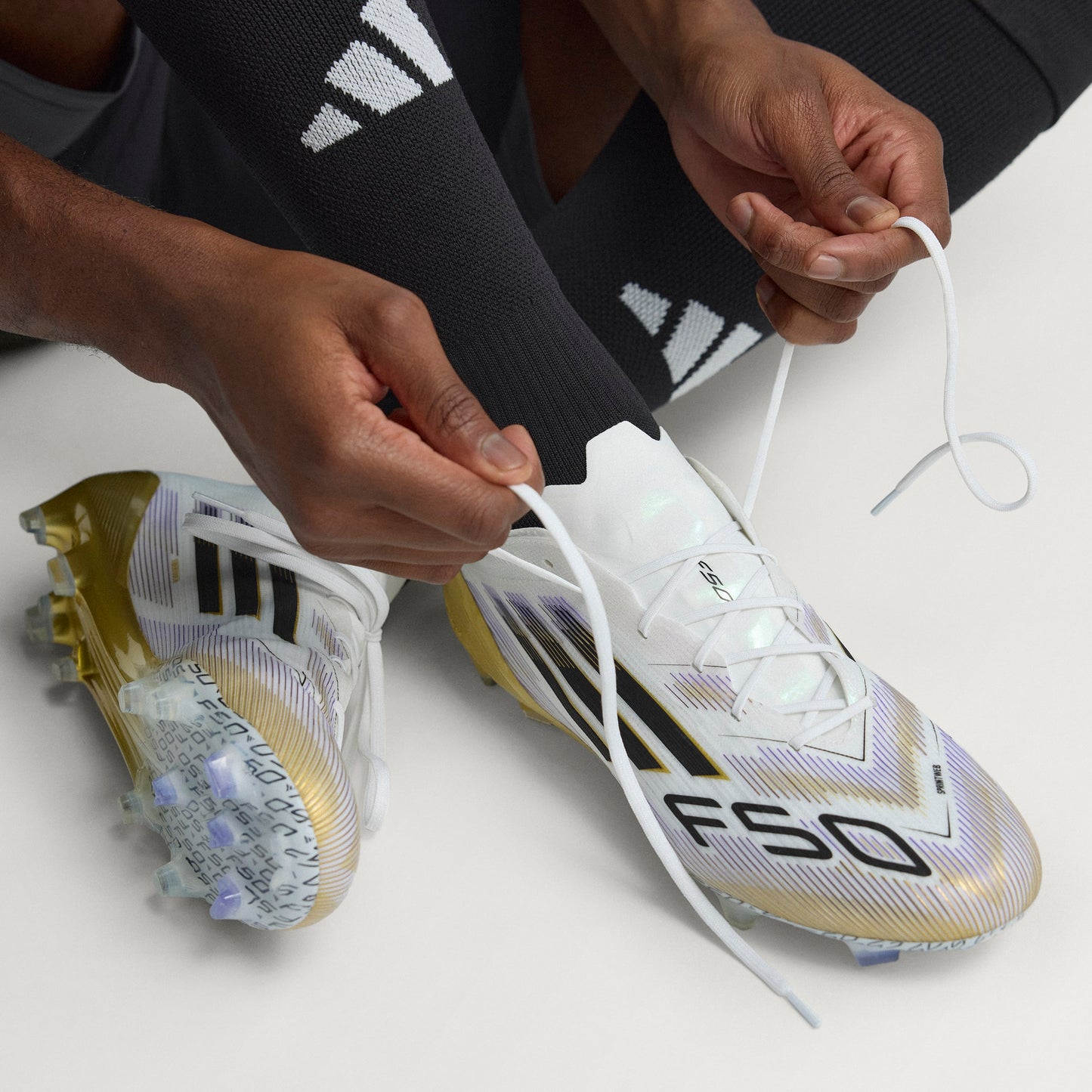 adidas F50 Elite FG - Cloud White / Core Black / Gold Metallic