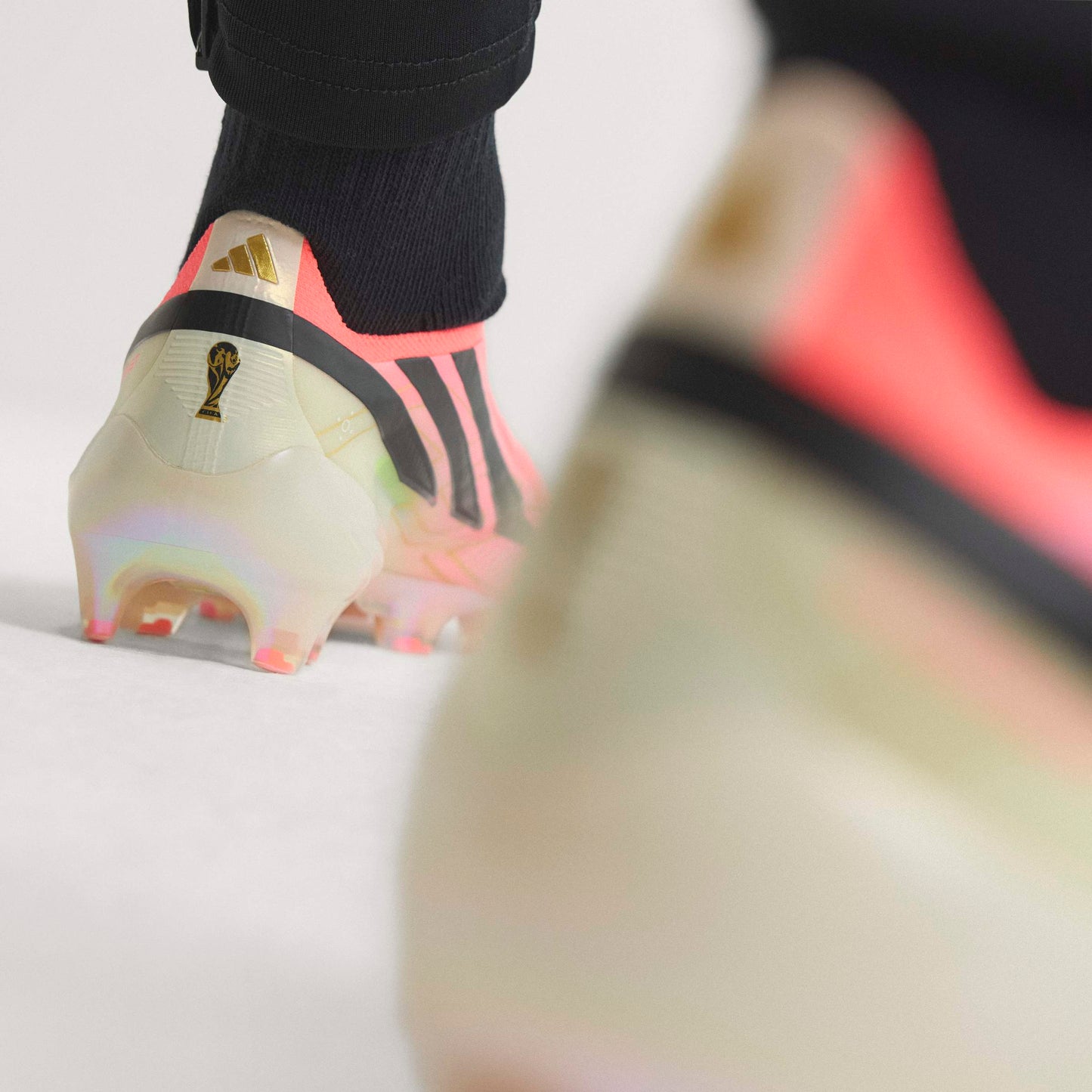 adidas F50 HYPERFAST ELITE Laceless FG - Solar Turbo / Core Black / Gold Metallic